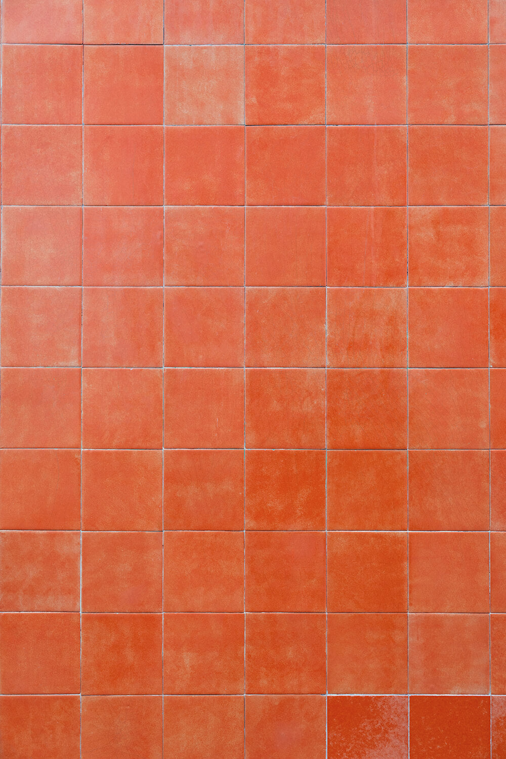 fond photo carrelage terracotta rouge pour photographie de restaurant, artisanat, bijoux, ambiance soleil, mediterrannée, bio, plage, apéro