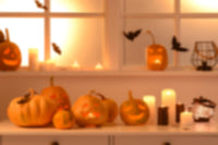 fond photo halloween avec citrouille et bougies cosy et chauve souris