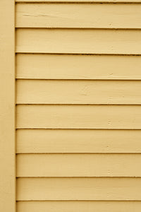 fond photo en bois jaune estival, photographie été et lumineuse, mur en bois ancien norvege