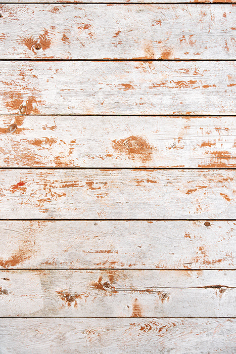 fond photo blanc en bois usé avec des traces orange pour l'automne en photographie culinaire ou studio photo